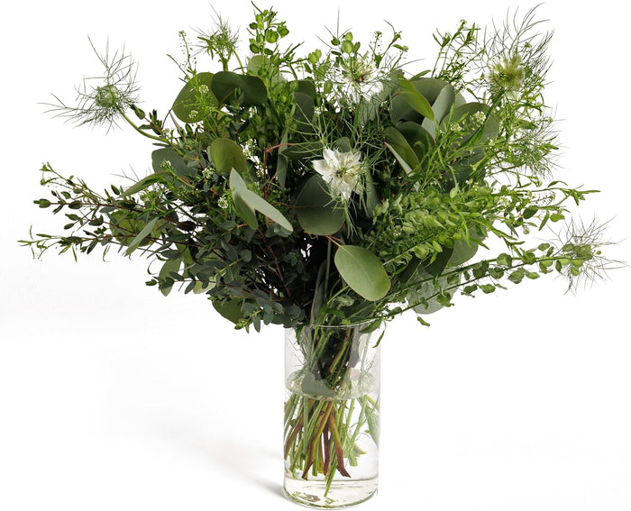 Green Harmony greenery bouquet with eucalyptus in a glass vase