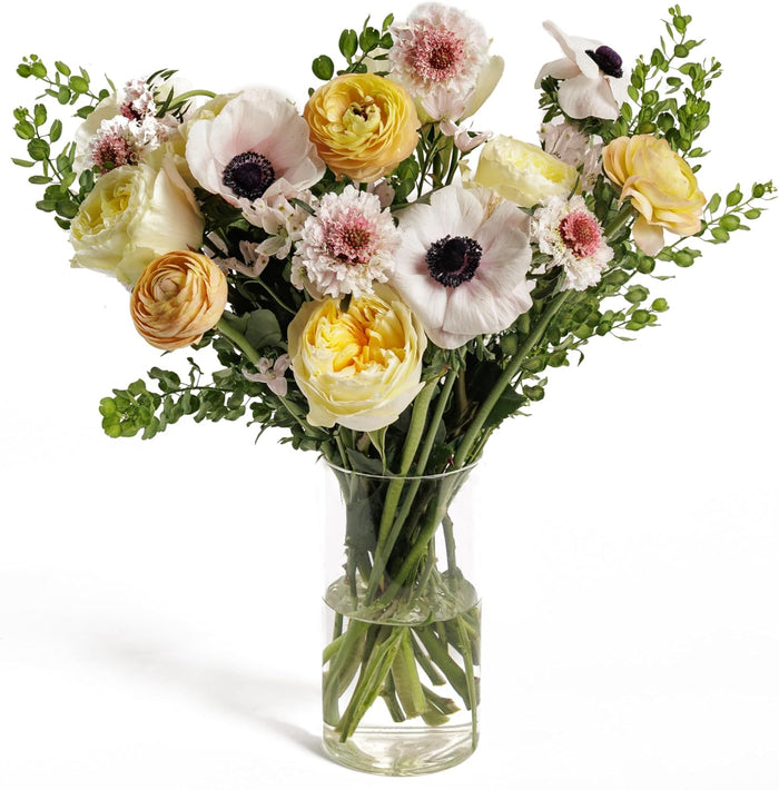 Spring Delight bouquet with ranunculus and garden roses in pastel tones