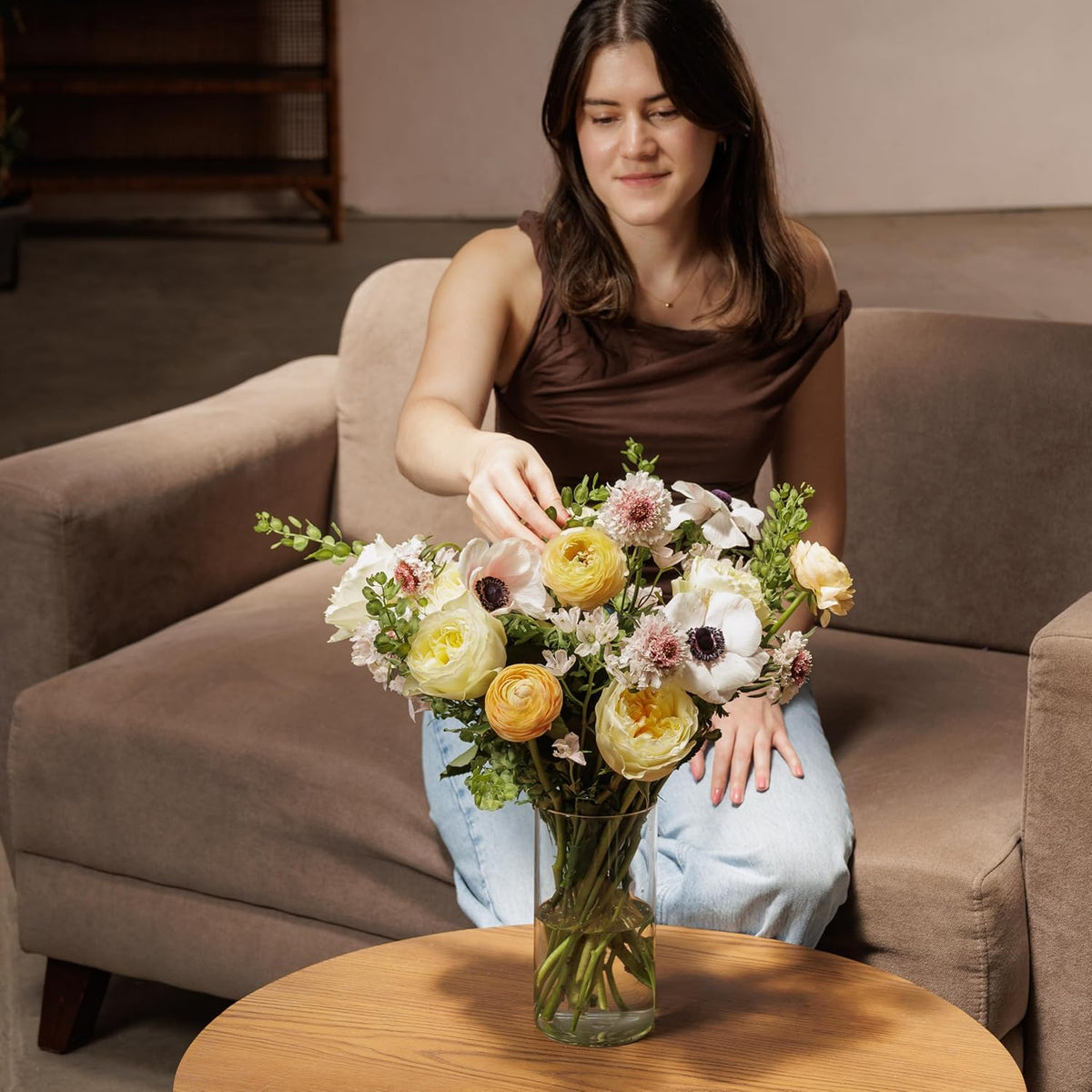 Woman holding the Spring Delight pastel bouquet