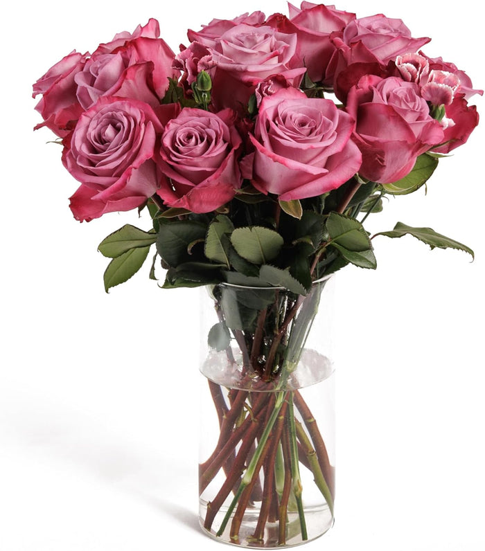 Mauve Elegance bouquet of lavender roses in a glass vase