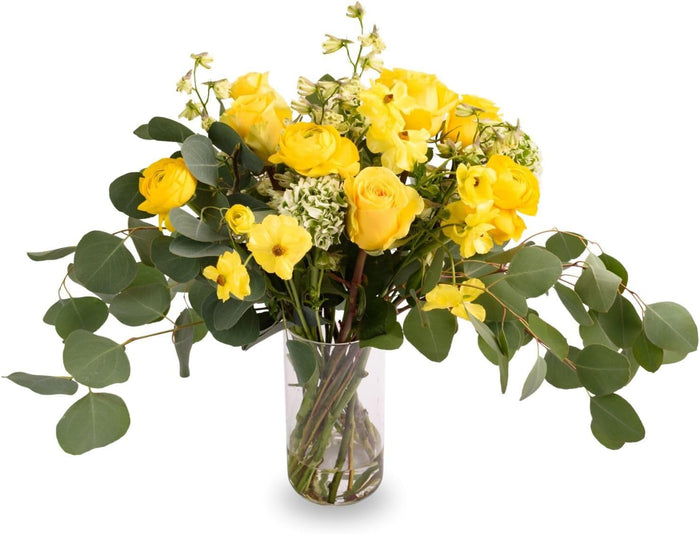 The Lemon Tonic Bouquet with yellow roses in a glass vase